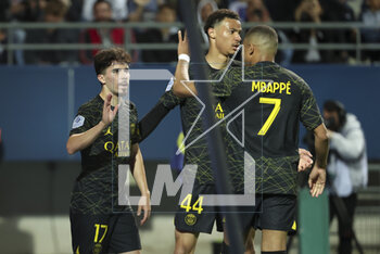 2023-05-07 - Vitinha of PSG celebrates his goal with Hugo Ekitike, Kylian Mbappe during the French championship Ligue 1 football match between Estac Troyes and Paris Saint-Germain on May 7, 2023 at l'Aube stadium in Troyes, France - FOOTBALL - FRENCH CHAMP - TROYES V PARIS SG - FRENCH LIGUE 1 - SOCCER