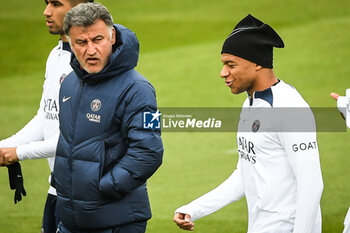 2023-05-12 - Christophe GALTIER of PSG and Kylian MBAPPE of PSG during the training of the Paris Saint-Germain team on May 12, 2023 at Camp des Loges in Saint-Germain-en-Laye near Paris, France - FOOTBALL - TRAINING OF THE PARIS SG TEAM - FRENCH LIGUE 1 - SOCCER