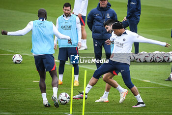 2023-05-12 - Lionel (Leo) MESSI of PSG, Carlos SOLER of PSG and Kylian MBAPPE of PSG during the training of the Paris Saint-Germain team on May 12, 2023 at Camp des Loges in Saint-Germain-en-Laye near Paris, France - FOOTBALL - TRAINING OF THE PARIS SG TEAM - FRENCH LIGUE 1 - SOCCER