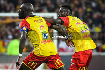 2023-05-12 - Seko FOFANA of Lens celebrate his goal with Salis ABDUL SAMED of Lens during the French championship Ligue 1 football match between RC Lens and Stade de Reims on May 12, 2023 at Bollaert-Delelis stadium in Lens, France - FOOTBALL - FRENCH CHAMP - LENS V REIMS - FRENCH LIGUE 1 - SOCCER