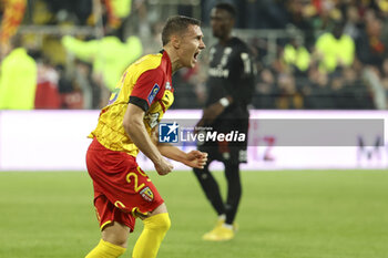 2023-05-12 - Przemyslaw Frankowski of Lens celebrates his goal during the French championship Ligue 1 football match between RC Lens and Stade de Reims on May 12, 2023 at Stade Bollaert-Delelis in Lens, France - FOOTBALL - FRENCH CHAMP - LENS V REIMS - FRENCH LIGUE 1 - SOCCER