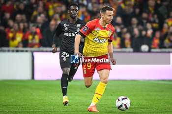 2023-05-12 - Folarin BALOGUN of Reims and Przemyslaw Adam FRANKOWSKI of Lens during the French championship Ligue 1 football match between RC Lens and Stade de Reims on May 12, 2023 at Bollaert-Delelis stadium in Lens, France - FOOTBALL - FRENCH CHAMP - LENS V REIMS - FRENCH LIGUE 1 - SOCCER