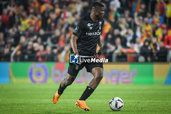 2023-05-12 - Emmanuel AGBADOU of Reims during the French championship Ligue 1 football match between RC Lens and Stade de Reims on May 12, 2023 at Bollaert-Delelis stadium in Lens, France - FOOTBALL - FRENCH CHAMP - LENS V REIMS - FRENCH LIGUE 1 - SOCCER