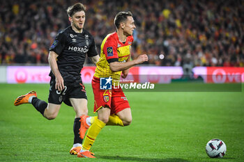 2023-05-12 - Thomas FOKET of Reims and Przemyslaw Adam FRANKOWSKI of Lens during the French championship Ligue 1 football match between RC Lens and Stade de Reims on May 12, 2023 at Bollaert-Delelis stadium in Lens, France - FOOTBALL - FRENCH CHAMP - LENS V REIMS - FRENCH LIGUE 1 - SOCCER