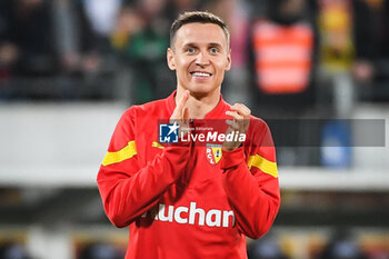 2023-05-12 - Przemyslaw Adam FRANKOWSKI of Lens celebrates the victory during the French championship Ligue 1 football match between RC Lens and Stade de Reims on May 12, 2023 at Bollaert-Delelis stadium in Lens, France - FOOTBALL - FRENCH CHAMP - LENS V REIMS - FRENCH LIGUE 1 - SOCCER