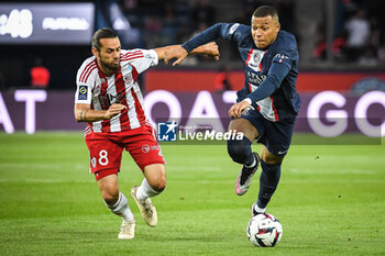 2023-05-13 - Vincent MARCHETTI of Ajaccio and Kylian MBAPPE of PSG during the French championship Ligue 1 football match between Paris Saint-Germain and AC Ajaccio on May 13, 2023 at Parc des Princes stadium in Paris, France - FOOTBALL - FRENCH CHAMP - PARIS SG V AJACCIO - FRENCH LIGUE 1 - SOCCER