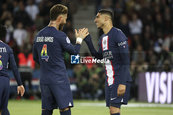 2023-05-13 - Achraf Hakimi of PSG celebrates his goal with Sergio Ramos (left) during the French championship Ligue 1 football match between Paris Saint-Germain and AC Ajaccio on May 13, 2023 at Parc des Princes stadium in Paris, France - FOOTBALL - FRENCH CHAMP - PARIS SG V AJACCIO - FRENCH LIGUE 1 - SOCCER