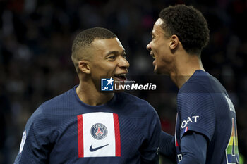 2023-05-13 - Kylian Mbappe of PSG celebrates his second goal with Hugo Ekitike during the French championship Ligue 1 football match between Paris Saint-Germain and AC Ajaccio on May 13, 2023 at Parc des Princes stadium in Paris, France - FOOTBALL - FRENCH CHAMP - PARIS SG V AJACCIO - FRENCH LIGUE 1 - SOCCER