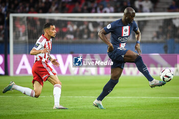 2023-05-13 - Michael BARRETO of Ajaccio and Danilo PEREIRA of PSG during the French championship Ligue 1 football match between Paris Saint-Germain and AC Ajaccio on May 13, 2023 at Parc des Princes stadium in Paris, France - FOOTBALL - FRENCH CHAMP - PARIS SG V AJACCIO - FRENCH LIGUE 1 - SOCCER