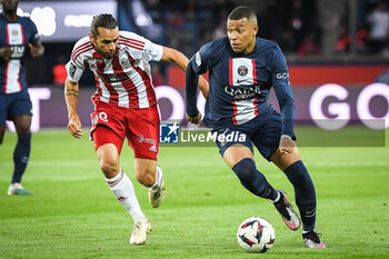2023-05-13 - Vincent MARCHETTI of Ajaccio and Kylian MBAPPE of PSG during the French championship Ligue 1 football match between Paris Saint-Germain and AC Ajaccio on May 13, 2023 at Parc des Princes stadium in Paris, France - FOOTBALL - FRENCH CHAMP - PARIS SG V AJACCIO - FRENCH LIGUE 1 - SOCCER