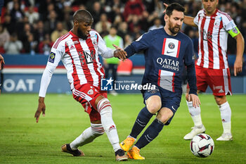 2023-05-13 - Mohamed YOUSSOUF of Ajaccio and Lionel (Leo) MESSI of PSG during the French championship Ligue 1 football match between Paris Saint-Germain and AC Ajaccio on May 13, 2023 at Parc des Princes stadium in Paris, France - FOOTBALL - FRENCH CHAMP - PARIS SG V AJACCIO - FRENCH LIGUE 1 - SOCCER