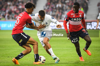 2023-05-20 - Leny YORO of Lille, Cengiz UNDER of Marseille and Timothy WEAH of Lille during the French championship Ligue 1 football match between Losc Lille and Olympique de Marseille on May 20, 2023 at Pierre Mauroy stadium in Villeneuve-d'Ascq near Lille, France - FOOTBALL - FRENCH CHAMP - LILLE V MARSEILLE - FRENCH LIGUE 1 - SOCCER
