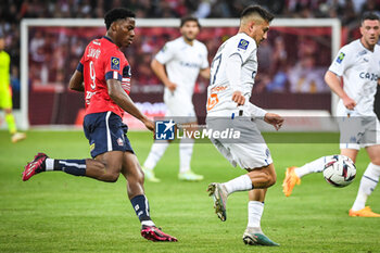 2023-05-20 - Jonathan DAVID of Lille and Cengiz UNDER of Marseille during the French championship Ligue 1 football match between Losc Lille and Olympique de Marseille on May 20, 2023 at Pierre Mauroy stadium in Villeneuve-d'Ascq near Lille, France - FOOTBALL - FRENCH CHAMP - LILLE V MARSEILLE - FRENCH LIGUE 1 - SOCCER