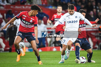 2023-05-20 - Leny YORO of Lille, Cengiz UNDER of Marseille and Benjamin ANDRE of Lille during the French championship Ligue 1 football match between Losc Lille and Olympique de Marseille on May 20, 2023 at Pierre Mauroy stadium in Villeneuve-d'Ascq near Lille, France - FOOTBALL - FRENCH CHAMP - LILLE V MARSEILLE - FRENCH LIGUE 1 - SOCCER