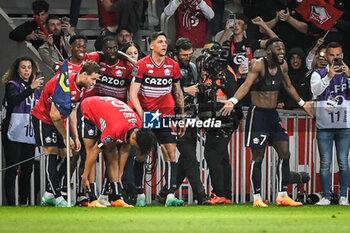 2023-05-20 - Jonathan BAMBA of Lille celebrate his goal with teammates during the French championship Ligue 1 football match between Losc Lille and Olympique de Marseille on May 20, 2023 at Pierre Mauroy stadium in Villeneuve-d'Ascq near Lille, France - FOOTBALL - FRENCH CHAMP - LILLE V MARSEILLE - FRENCH LIGUE 1 - SOCCER