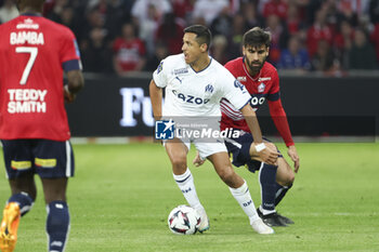 2023-05-20 - Alexis Sanchez of Marseille, Andre Gomes of Lille during the French championship Ligue 1 Uber Eats football match between Lille OSC (LOSC) and Olympique de Marseille (OM) on May 20, 2023 at Stade Pierre Mauroy in Villeneuve-d'Ascq near Lille, France - FOOTBALL - FRENCH CHAMP - LILLE V MARSEILLE - FRENCH LIGUE 1 - SOCCER