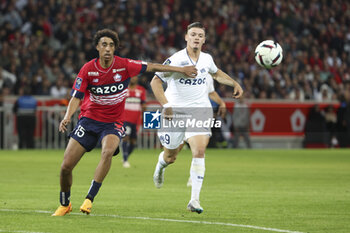 2023-05-20 - Leny Yoro of Lille, Vitinha aka Vitor Oliveira of Marseille during the French championship Ligue 1 Uber Eats football match between Lille OSC (LOSC) and Olympique de Marseille (OM) on May 20, 2023 at Stade Pierre Mauroy in Villeneuve-d'Ascq near Lille, France - FOOTBALL - FRENCH CHAMP - LILLE V MARSEILLE - FRENCH LIGUE 1 - SOCCER
