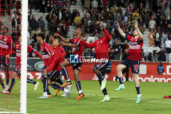2023-05-20 - Players of Lille celebrate the victory following the French championship Ligue 1 Uber Eats football match between Lille OSC (LOSC) and Olympique de Marseille (OM) on May 20, 2023 at Stade Pierre Mauroy in Villeneuve-d'Ascq near Lille, France - FOOTBALL - FRENCH CHAMP - LILLE V MARSEILLE - FRENCH LIGUE 1 - SOCCER