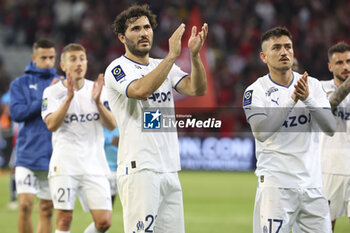2023-05-20 - Sead Kolasinac, Cengiz Under of Marseille salute the supporters following the French championship Ligue 1 Uber Eats football match between Lille OSC (LOSC) and Olympique de Marseille (OM) on May 20, 2023 at Stade Pierre Mauroy in Villeneuve-d'Ascq near Lille, France - FOOTBALL - FRENCH CHAMP - LILLE V MARSEILLE - FRENCH LIGUE 1 - SOCCER