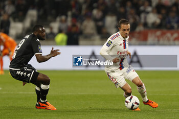 2023-05-19 - Maxence CAQUERET of Lyon and Youssouf FOFANA of Monaco during the French championship Ligue 1 football match between Olympique Lyonnais (Lyon) and AS Monaco on May 19, 2023 at Groupama Stadium in Decines-Charpieu near Lyon, France - FOOTBALL - FRENCH CHAMP - LYON V MONACO - FRENCH LIGUE 1 - SOCCER