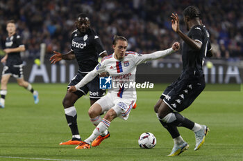 19/05/2023 - Maxence CAQUERET of Lyon and Youssouf FOFANA of Monaco and Axel DISASI of Monaco during the French championship Ligue 1 football match between Olympique Lyonnais (Lyon) and AS Monaco on May 19, 2023 at Groupama Stadium in Decines-Charpieu near Lyon, France - FOOTBALL - FRENCH CHAMP - LYON V MONACO - FRENCH LIGUE 1 - CALCIO