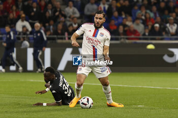 2023-05-19 - Rayan CHERKI of Lyon and Chrislain MATSIMA of Monaco during the French championship Ligue 1 football match between Olympique Lyonnais (Lyon) and AS Monaco on May 19, 2023 at Groupama Stadium in Decines-Charpieu near Lyon, France - FOOTBALL - FRENCH CHAMP - LYON V MONACO - FRENCH LIGUE 1 - SOCCER