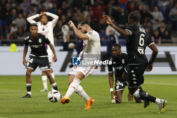 2023-05-19 - Rayan CHERKI of Lyon and Axel DISASI of Monaco during the French championship Ligue 1 football match between Olympique Lyonnais (Lyon) and AS Monaco on May 19, 2023 at Groupama Stadium in Decines-Charpieu near Lyon, France - FOOTBALL - FRENCH CHAMP - LYON V MONACO - FRENCH LIGUE 1 - SOCCER