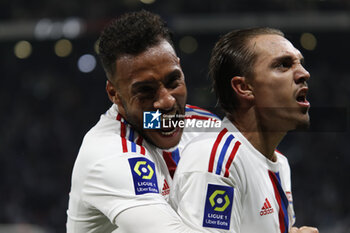 2023-05-19 - Maxence CAQUERET of Lyon celebrate a goal and Corentin TOLISSO of Lyon during the French championship Ligue 1 football match between Olympique Lyonnais (Lyon) and AS Monaco on May 19, 2023 at Groupama Stadium in Decines-Charpieu near Lyon, France - FOOTBALL - FRENCH CHAMP - LYON V MONACO - FRENCH LIGUE 1 - SOCCER