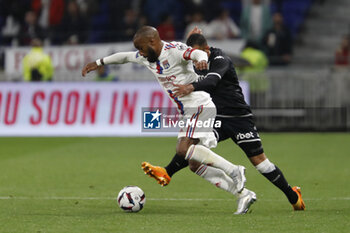 2023-05-19 - Alexandre LACAZETTE of Lyon and Vanderson DE OLIVEIRA CAMPOS of Monaco during the French championship Ligue 1 football match between Olympique Lyonnais (Lyon) and AS Monaco on May 19, 2023 at Groupama Stadium in Decines-Charpieu near Lyon, France - FOOTBALL - FRENCH CHAMP - LYON V MONACO - FRENCH LIGUE 1 - SOCCER