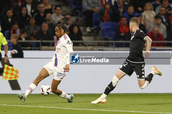 2023-05-19 - Bradley BARCOLA of Lyon and Caio HENRIQUE of Monaco during the French championship Ligue 1 football match between Olympique Lyonnais (Lyon) and AS Monaco on May 19, 2023 at Groupama Stadium in Decines-Charpieu near Lyon, France - FOOTBALL - FRENCH CHAMP - LYON V MONACO - FRENCH LIGUE 1 - SOCCER