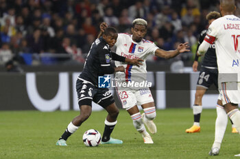 19/05/2023 - Mohamed CAMARA of Monaco and Thiago MENDES of Lyon during the French championship Ligue 1 football match between Olympique Lyonnais (Lyon) and AS Monaco on May 19, 2023 at Groupama Stadium in Decines-Charpieu near Lyon, France - FOOTBALL - FRENCH CHAMP - LYON V MONACO - FRENCH LIGUE 1 - CALCIO