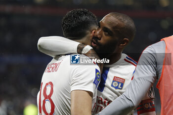 19/05/2023 - Rayan CHERKI of Lyon celebrate score a goal and Alexandre LACAZETTE of Lyon during the French championship Ligue 1 football match between Olympique Lyonnais (Lyon) and AS Monaco on May 19, 2023 at Groupama Stadium in Decines-Charpieu near Lyon, France - FOOTBALL - FRENCH CHAMP - LYON V MONACO - FRENCH LIGUE 1 - CALCIO