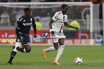 19/05/2023 - Castello LUKEBA of Lyon and Breel EMBOLO of Monaco during the French championship Ligue 1 football match between Olympique Lyonnais (Lyon) and AS Monaco on May 19, 2023 at Groupama Stadium in Decines-Charpieu near Lyon, France - FOOTBALL - FRENCH CHAMP - LYON V MONACO - FRENCH LIGUE 1 - CALCIO