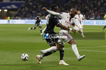 2023-05-19 - Alexandre LACAZETTE of Lyon and Chrislain MATSIMA of Monaco during the French championship Ligue 1 football match between Olympique Lyonnais (Lyon) and AS Monaco on May 19, 2023 at Groupama Stadium in Decines-Charpieu near Lyon, France - FOOTBALL - FRENCH CHAMP - LYON V MONACO - FRENCH LIGUE 1 - SOCCER