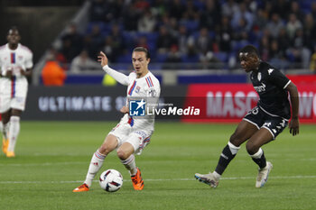 2023-05-19 - Maxence CAQUERET of Lyon and Eliot MATAZO of Monaco during the French championship Ligue 1 football match between Olympique Lyonnais (Lyon) and AS Monaco on May 19, 2023 at Groupama Stadium in Decines-Charpieu near Lyon, France - FOOTBALL - FRENCH CHAMP - LYON V MONACO - FRENCH LIGUE 1 - SOCCER