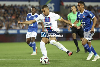 2023-05-27 - Kylian Mbappe of PSG, Colin Dagba of Strasbourg during the French championship Ligue 1 Uber Eats football match between RC Strasbourg Alsace (RCSA) and Paris Saint-Germain (PSG) on May 27, 2023 at Stade de La Meinau in Strasbourg, France - FOOTBALL - FRENCH CHAMP - STRASBOURG V PARIS SG - FRENCH LIGUE 1 - SOCCER