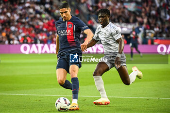 2023-06-03 - Achraf HAKIMI of PSG and Alidu SEIDU of Clermont during the French championship Ligue 1 football match between Paris Saint-Germain and Clermont Foot 63 on June 3, 2023 at Parc des Princes stadium in Paris, France - FOOTBALL - FRENCH CHAMP - PARIS SG V CLERMONT - FRENCH LIGUE 1 - SOCCER