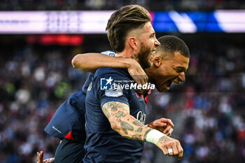 2023-06-03 - Sergio RAMOS of PSG celebrate his goal with Kylian MBAPPE of PSG during the French championship Ligue 1 football match between Paris Saint-Germain and Clermont Foot 63 on June 3, 2023 at Parc des Princes stadium in Paris, France - FOOTBALL - FRENCH CHAMP - PARIS SG V CLERMONT - FRENCH LIGUE 1 - SOCCER