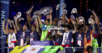 2023-06-03 - Marquinhos of PSG and teammates celebrate during the trophy ceremony following the French championship Ligue 1 football match between Paris Saint-Germain (PSG) and Clermont Foot 63 on June 3, 2023 at Parc des Princes stadium in Paris, France - FOOTBALL - FRENCH CHAMP - PARIS SG V CLERMONT - FRENCH LIGUE 1 - SOCCER