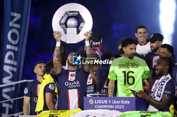 2023-06-03 - Sergio Ramos, Marquinhos, Renato Sanches of PSG and teammates celebrate during the trophy ceremony following the French championship Ligue 1 football match between Paris Saint-Germain (PSG) and Clermont Foot 63 on June 3, 2023 at Parc des Princes stadium in Paris, France - FOOTBALL - FRENCH CHAMP - PARIS SG V CLERMONT - FRENCH LIGUE 1 - SOCCER