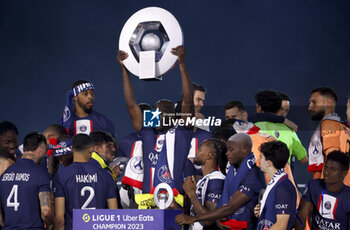 2023-06-03 - Danilo Pereira of PSG and teammates celebrate during the trophy ceremony following the French championship Ligue 1 football match between Paris Saint-Germain (PSG) and Clermont Foot 63 on June 3, 2023 at Parc des Princes stadium in Paris, France - FOOTBALL - FRENCH CHAMP - PARIS SG V CLERMONT - FRENCH LIGUE 1 - SOCCER