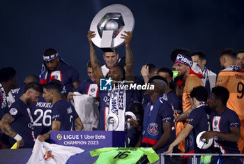2023-06-03 - Renato Sanches of PSG and teammates celebrate during the trophy ceremony following the French championship Ligue 1 football match between Paris Saint-Germain (PSG) and Clermont Foot 63 on June 3, 2023 at Parc des Princes stadium in Paris, France - FOOTBALL - FRENCH CHAMP - PARIS SG V CLERMONT - FRENCH LIGUE 1 - SOCCER