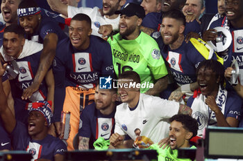2023-06-03 - Kylian Mbappe, Neymar Jr, Sergio Ramos, below Lionel Messi, Marco Verratti of PSG during the trophy ceremony following the French championship Ligue 1 football match between Paris Saint-Germain (PSG) and Clermont Foot 63 on June 3, 2023 at Parc des Princes stadium in Paris, France - FOOTBALL - FRENCH CHAMP - PARIS SG V CLERMONT - FRENCH LIGUE 1 - SOCCER