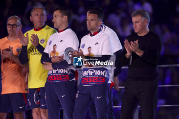 2023-06-03 - Coach of PSG Christophe Galtier (right) and his staff during the Ligue 1 trophy ceremony following the French championship Ligue 1 football match between Paris Saint-Germain (PSG) and Clermont Foot 63 on June 3, 2023 at Parc des Princes stadium in Paris, France - FOOTBALL - FRENCH CHAMP - PARIS SG V CLERMONT - FRENCH LIGUE 1 - SOCCER