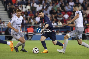 2023-06-03 - Lionel Messi of PSG, left Maximiliano Caufriez of Clermont during the French championship Ligue 1 football match between Paris Saint-Germain (PSG) and Clermont Foot 63 on June 3, 2023 at Parc des Princes stadium in Paris, France - FOOTBALL - FRENCH CHAMP - PARIS SG V CLERMONT - FRENCH LIGUE 1 - SOCCER