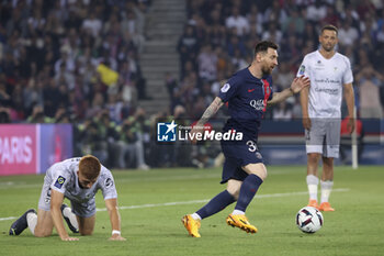 2023-06-03 - Lionel Messi of PSG, left Maximiliano Caufriez of Clermont during the French championship Ligue 1 football match between Paris Saint-Germain (PSG) and Clermont Foot 63 on June 3, 2023 at Parc des Princes stadium in Paris, France - FOOTBALL - FRENCH CHAMP - PARIS SG V CLERMONT - FRENCH LIGUE 1 - SOCCER