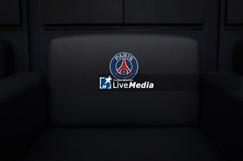 2023-07-05 - This illustration shows the official PSG logo on a seat in the changing room at the Campus PSG, the new training center for the Paris Saint-Germain football team on July 5, 2023 in Poissy, France - FOOTBALL - PARIS SG NEW TRAINING CENTER - FRENCH LIGUE 1 - SOCCER