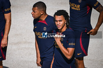 2023-07-20 - Kylian MBAPPE of PSG and Ethan MBAPPE of PSG during the training of the Paris Saint-Germain team on July 20, 2023 at Campus PSG in Poissy, France - FOOTBALL - TRAINING OF THE PARIS SG TEAM - FRENCH LIGUE 1 - SOCCER