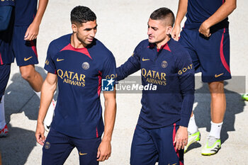 2023-08-11 - Achraf HAKIMI of PSG and Marco VERRATTI of PSG during the training of the Paris Saint-Germain team on August 11, 2023 at Campus PSG in Poissy, France - FOOTBALL - PARIS SG TRAINING AND PRESS CONFERENCE - FRENCH LIGUE 1 - SOCCER