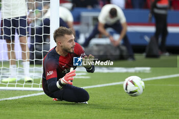 2023-08-13 - PSG goalkeeper Arnau Tenas warms up before the French championship Ligue 1 football match between Paris Saint-Germain (PSG) and FC Lorient on August 12, 2023 at Parc des Princes stadium in Paris, France - FOOTBALL - FRENCH CHAMP - PARIS SG V LORIENT - FRENCH LIGUE 1 - SOCCER